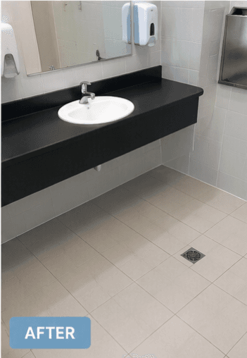 After — bathroom floor restored by Assured Cleaning